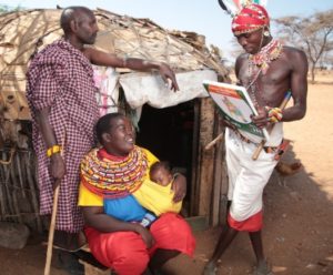 A community health volunteer offers family planning information during a home visit. Photo: Edna Mosiara, AFYA TIMIZA.