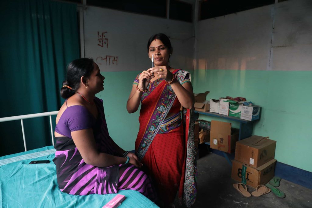 A women in India receiving contraceptive medicine. Photo: Paula Bronstein /The Verbatim Agency/Getty Images