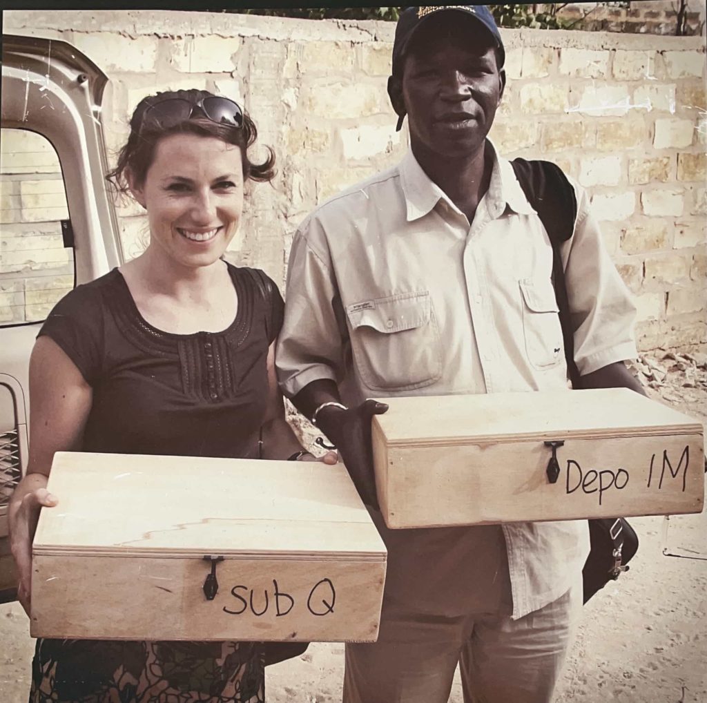 Catherine Packer (FHI 360) and Ibrahima Mall (Centre de Formation et de Rercherche en Santé [CEFOREP]) carry DMPA-SC and DMPA-IM to study sites in Senegal in 2012. Image credit: Daouda Mbengue