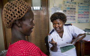 Head antenatal nurse Margie Harriet Egessa providing antenatal counseling and checkups for a group of pregnant women at Mukujju clinic. This clinic is supported by DSW. Photo credit: Jonathan Torgovnik/Getty Images/Images of Empowerment