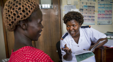 Head antenatal nurse Margie Harriet Egessa providing antenatal counseling and checkups for a group of pregnant women at Mukujju clinic. This clinic is supported by DSW. Photo credit: Jonathan Torgovnik/Getty Images/Images of Empowerment