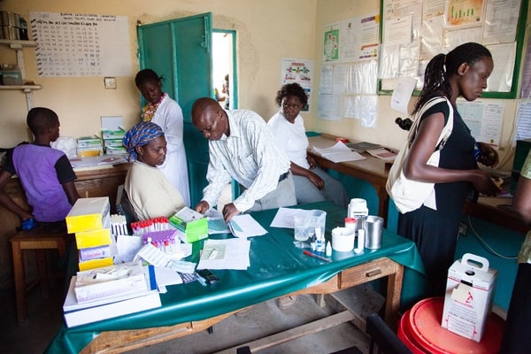 Health workers at Rabur health center take stock of commodities. | Credit: USAID Kenya