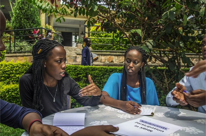 Youth champions gather to discuss challenges they and their peers encounter when trying to advocate for sexual and reproductive health and rights in their communities. Credit: Yagazie Emezi/Getty Images/Images of Empowerment.