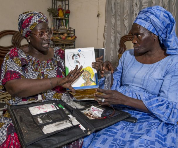 Community health worker during a home visit, providing family planning services and options to a woman in Dakar, Senegal. Photo credit: Jonathan Torgovnik/Getty Images/Images of Empowerment