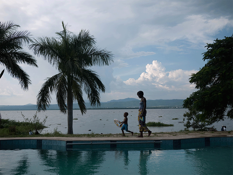 A woman and child walk together near the Lake Victoria basin in Kenya. Photo Credit: Lucas Bergstrom
