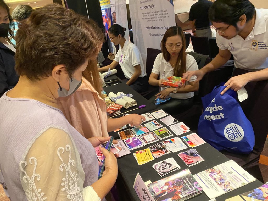 Various booths manned by several non-government organizations during the RH Law 10th year anniversary event offering different RH products from publications and advocacy stickers to lubricants and condoms. Photo courtesy of Grace Gayoso Pasion.