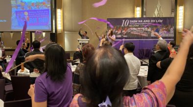 RH champions and advocates wave purple flags while singing Lila (purple), the RH advocacy anthem. Purple symbolizes women’s rights. Photo courtesy of Grace Gayoso Pasion.