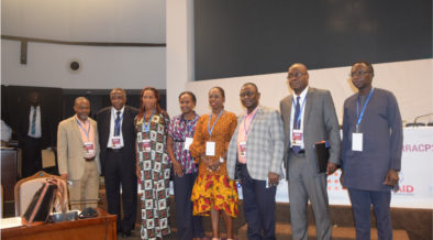 A group of African people standing on a stage. Photo credit: La Communauté de Pratique PFPP intégrée à la SMNI/Nutrition