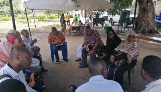 Community members give feedback and respond to various questions around family planning, postabortion care, data, youth, disability, GBV, and supply chain commodities for family planning. Photo credit: Dr. Katanta Msole