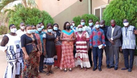 A group of men and women in Burkina Faso.